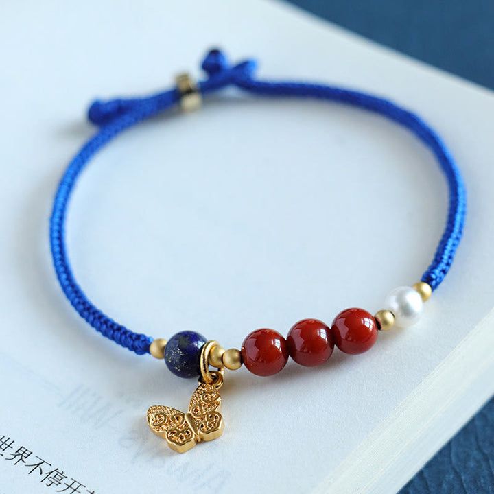 Bracelet en Buddha Stones, bleu Klein, agate rouge du Sud, grenat, aventurine bleue, lazurite, lapis-lazuli et cuivre, papillon, caractère Fu, positif - image 3