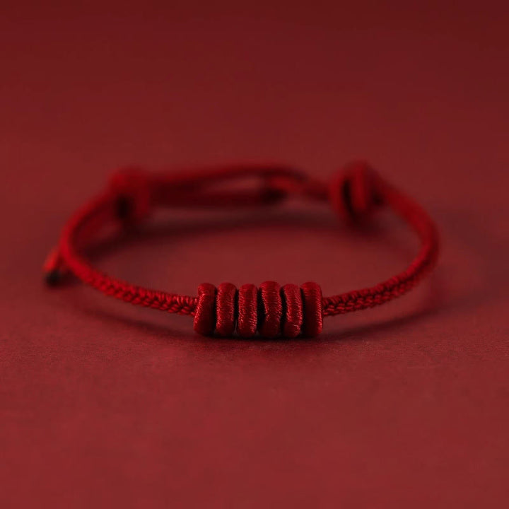Bracelet de force en corde rouge à huit brins Buddha Stones