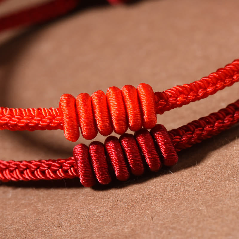 Bracelet de force en corde rouge à huit brins Buddha Stones
