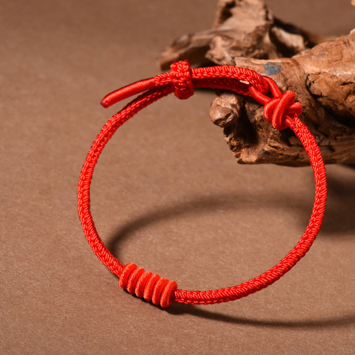 Bracelet de force en corde rouge à huit brins Buddha Stones