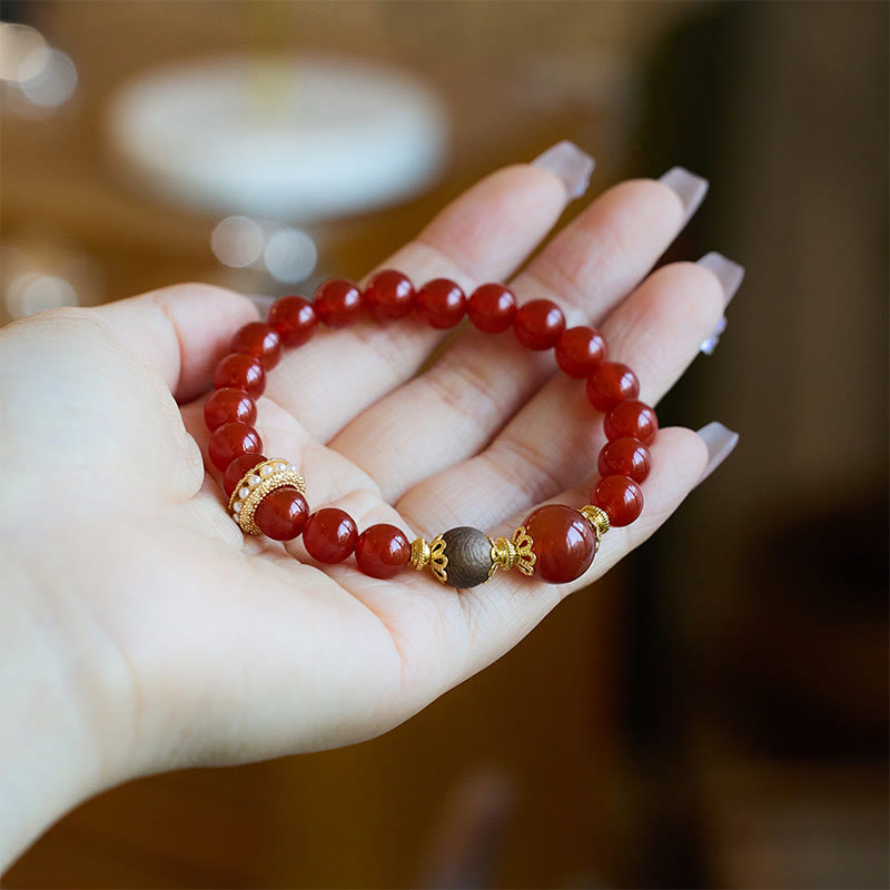 Bracelet de confiance en agate rouge et bois d'agar Buddha Stones