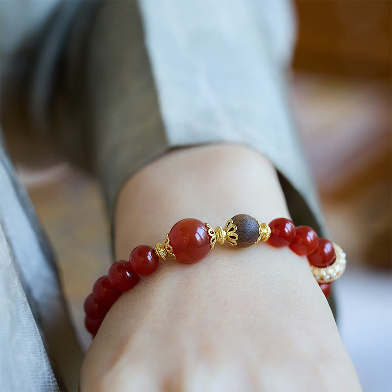 Bracelet de confiance en agate rouge et bois d'agar Buddha Stones