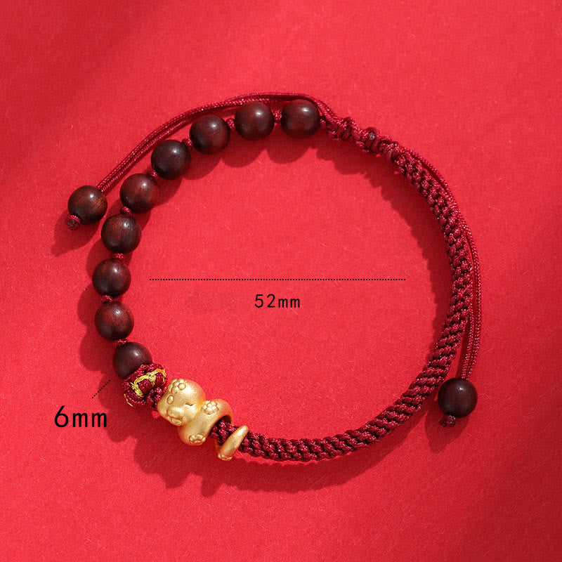 Bracelet tressé en corde de coton avec perles en bois de santal rouge et petites feuilles de Buddha Stones 999 Année du serpent