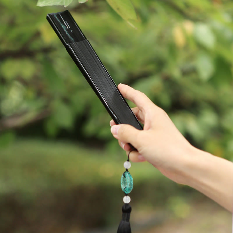 Éventail pliable à main en bambou et soie avec grue de montagne et de rivière rétro Buddha Stones