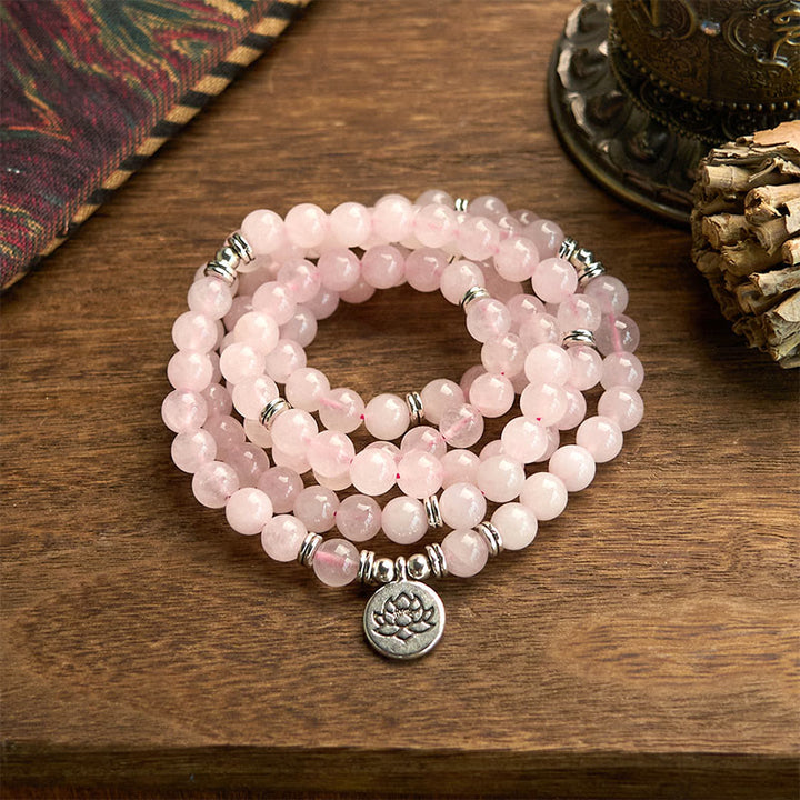 Bracelet Mala 108 Buddha Stones en pierre naturelle de quartz rose et lotus de la paix