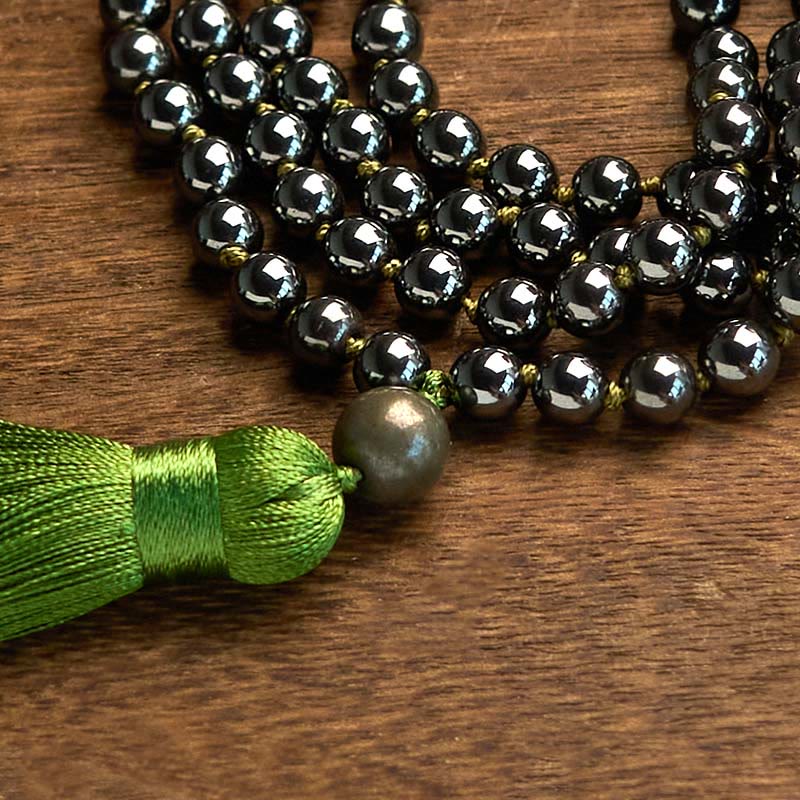 Bracelet puissant en Buddha Stones de Mala en pierre naturelle et pompon