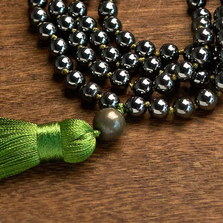Bracelet puissant en Buddha Stones de Mala en pierre naturelle et pompon