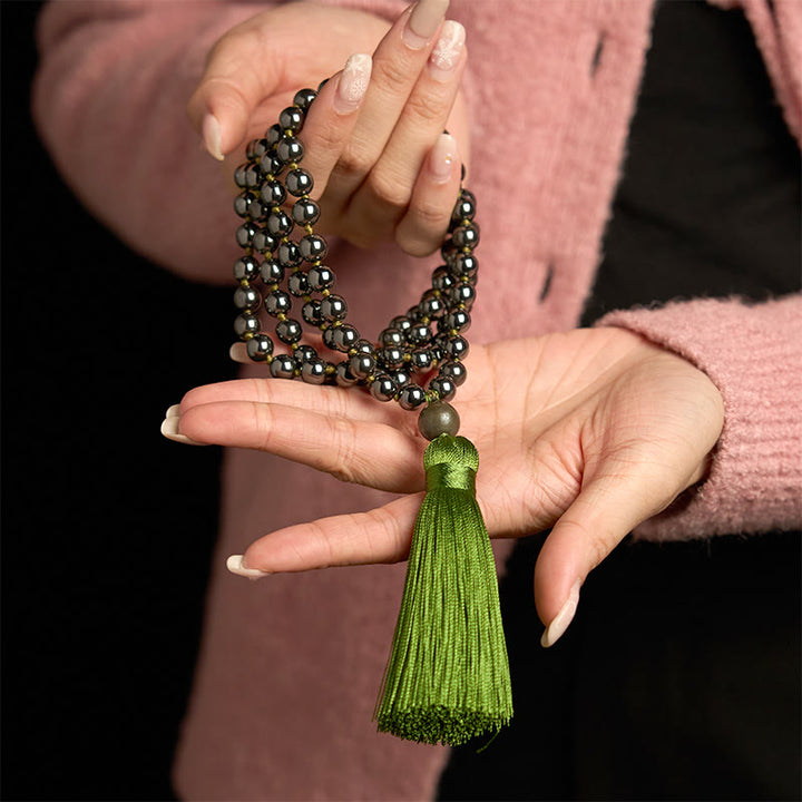 Bracelet puissant en Buddha Stones de Mala en pierre naturelle et pompon