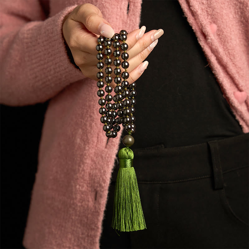 Bracelet puissant en Buddha Stones de Mala en pierre naturelle et pompon