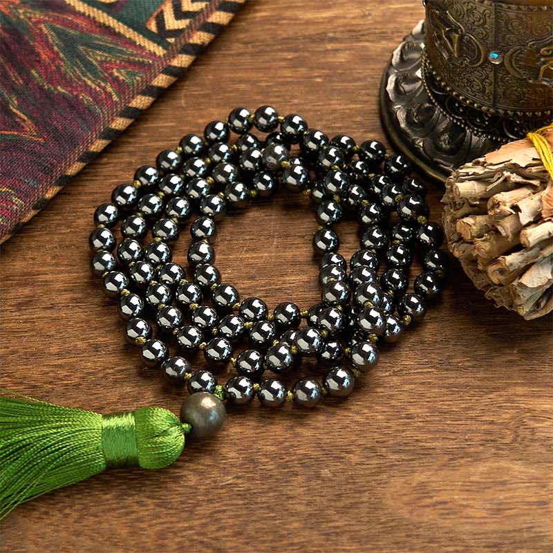 Bracelet puissant en Buddha Stones de Mala en pierre naturelle et pompon - Hématite (Tour de poignet : 14-16 cm) - image 0
