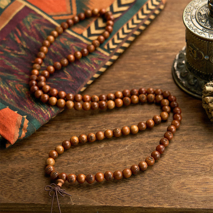 Bracelet de protection mantra de la lumière dorée en bois de jujubier frappé par la foudre avec 108 perles de Mala Buddha Stones