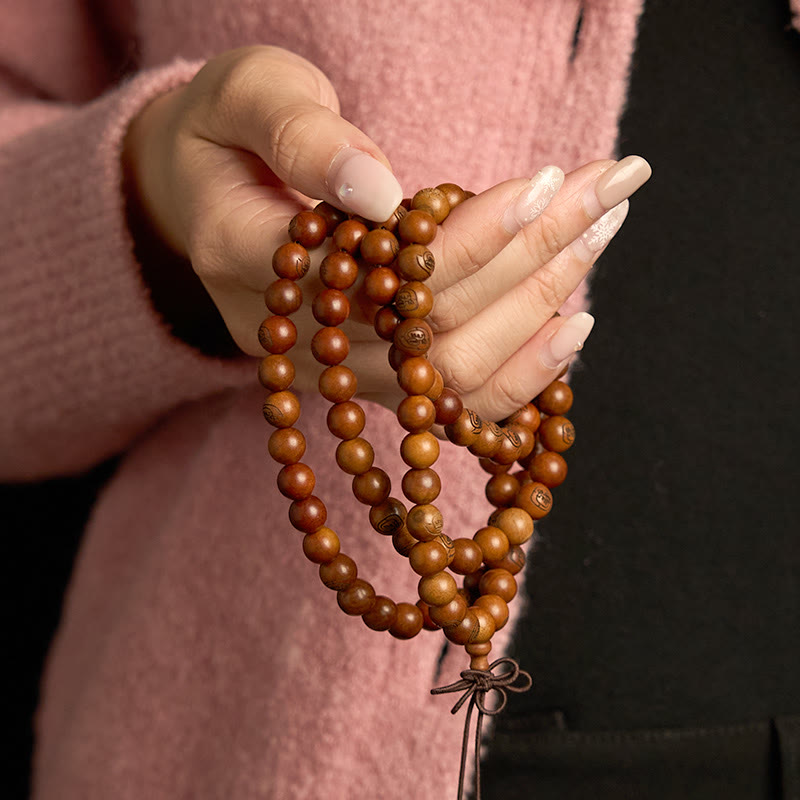 Bracelet de protection mantra de la lumière dorée en bois de jujubier frappé par la foudre avec 108 perles de Mala Buddha Stones
