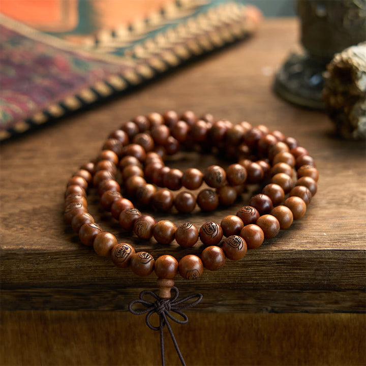 Bracelet de protection mantra de la lumière dorée en bois de jujubier frappé par la foudre avec 108 perles de Mala Buddha Stones