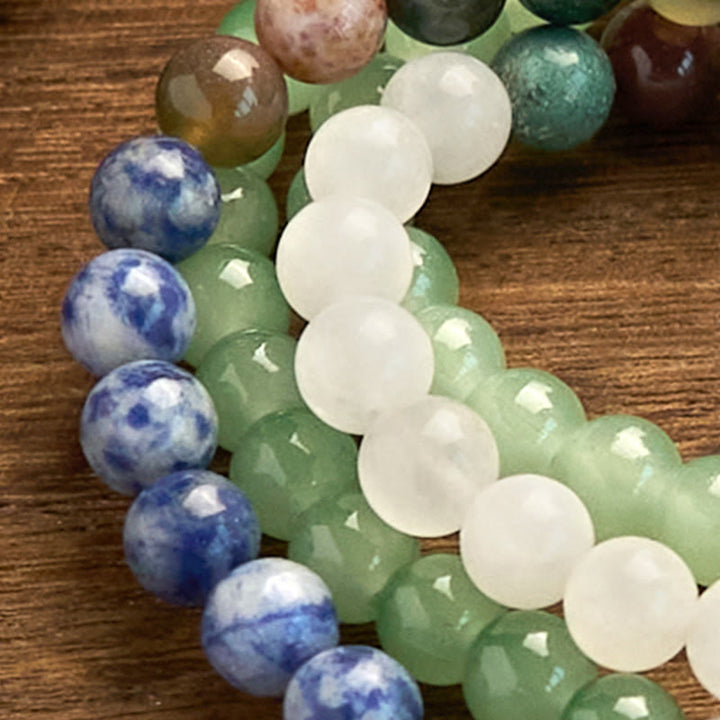 Bracelet porte-bonheur en 108 Buddha Stones de Mala en aventurine verte naturelle et jaspe à pois bleus, agate indienne, pompon vert