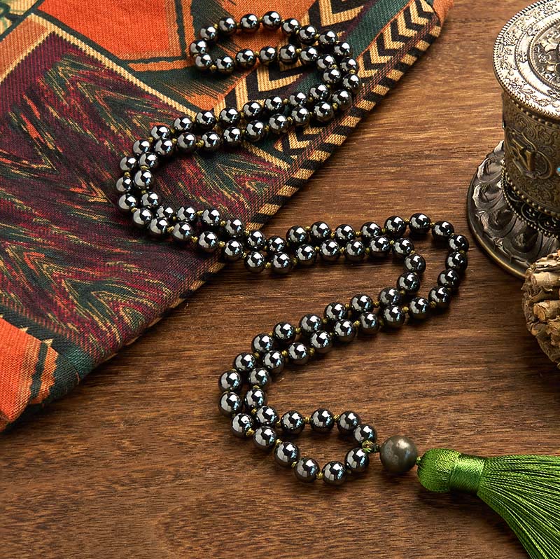 Bracelet puissant en Buddha Stones de Mala en pierre naturelle et pompon