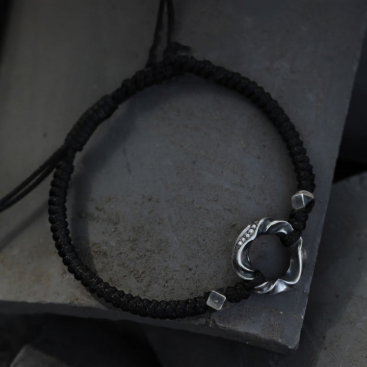 Bracelet de protection en corde cirée noire avec boucle de paix en argent sterling 999 de Buddha Stones - image 1