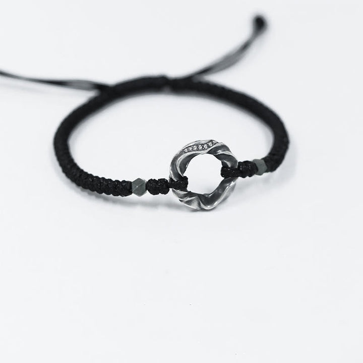 Bracelet de protection en corde cirée noire avec boucle de paix en argent sterling 999 de Buddha Stones