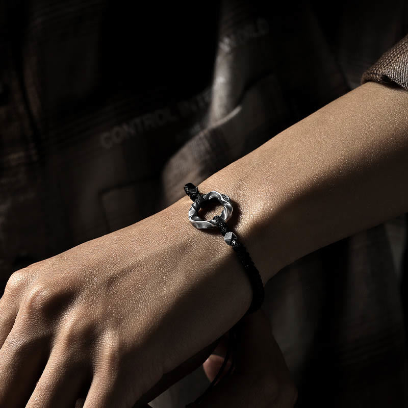 Bracelet de protection en corde cirée noire avec boucle de paix en argent sterling 999 de Buddha Stones