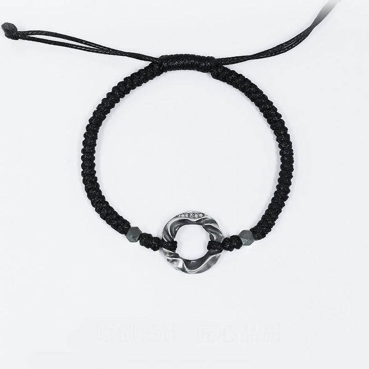 Bracelet de protection en corde cirée noire avec boucle de paix en argent sterling 999 de Buddha Stones