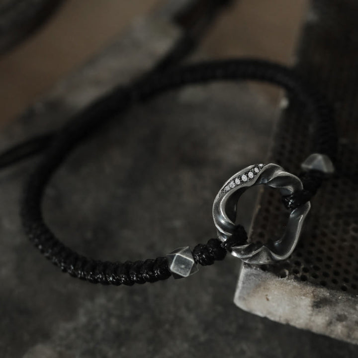 Bracelet de protection en corde cirée noire avec boucle de paix en argent sterling 999 de Buddha Stones