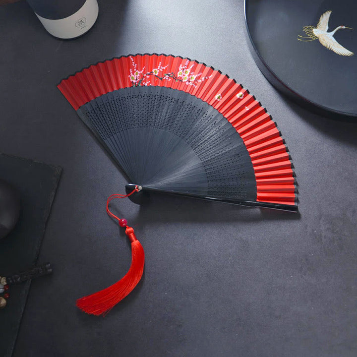 Éventail pliant en bambou avec peinture en aérosol en forme de lapin et de fleur en Buddha Stones