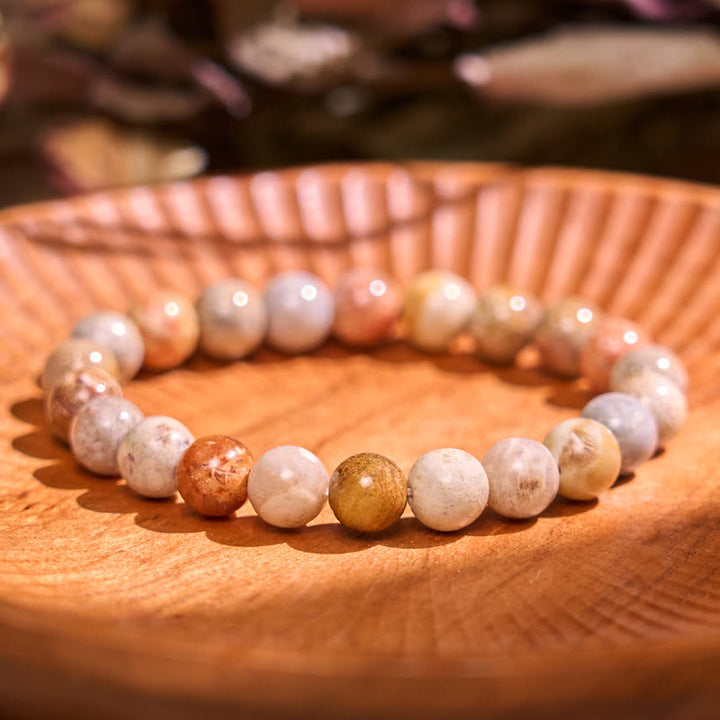 Bracelet de courage positif de la série de couleurs chaudes Buddha Stones stimulent la vitalité