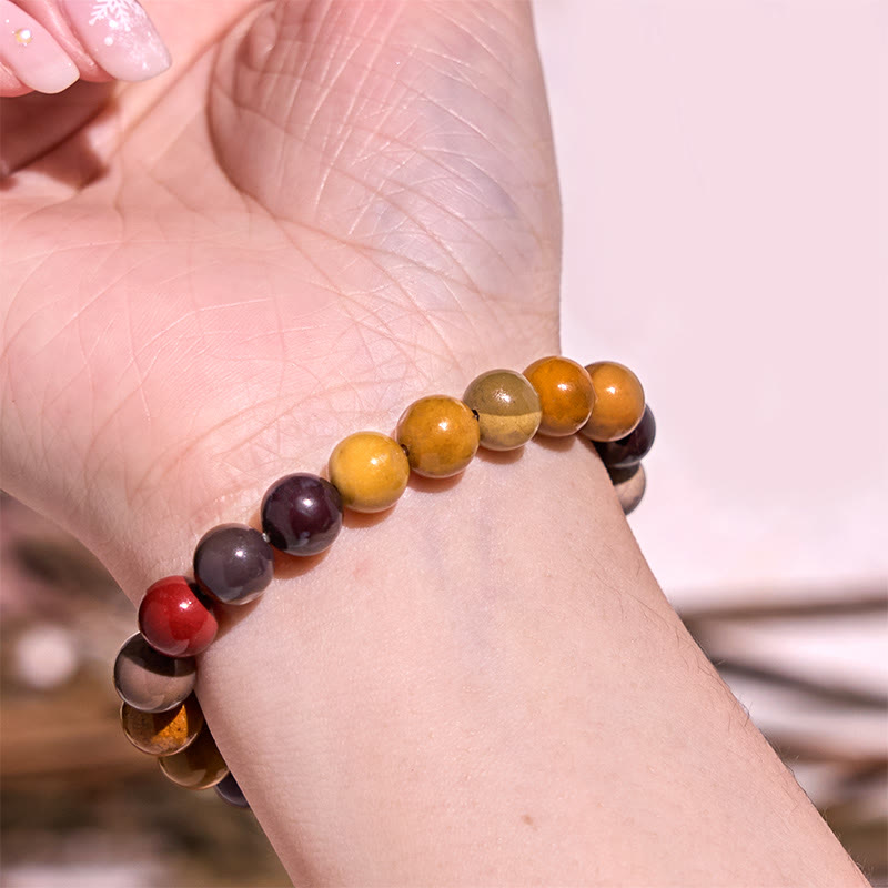Bracelet de courage positif de la série de couleurs chaudes Buddha Stones stimulent la vitalité