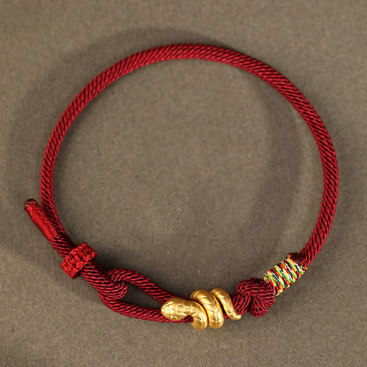 Bracelet tressé en corde de protection porte-bonheur fait main en or 999 avec motif de l'année du serpent