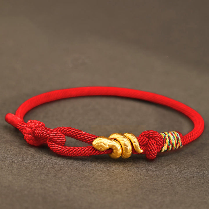 Bracelet tressé en corde de protection porte-bonheur fait main en or 999 avec motif de l'année du serpent