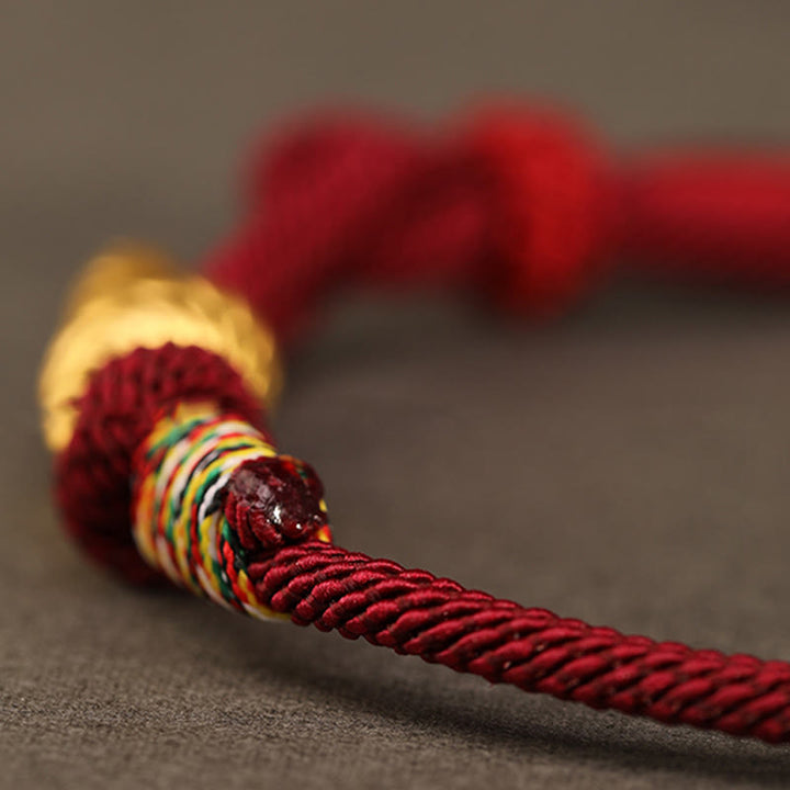 Bracelet tressé en corde de protection porte-bonheur fait main en or 999 avec motif de l'année du serpent