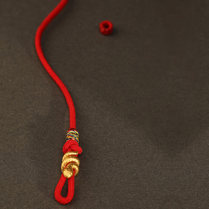 Bracelet tressé en corde de protection porte-bonheur fait main en or 999 avec motif de l'année du serpent