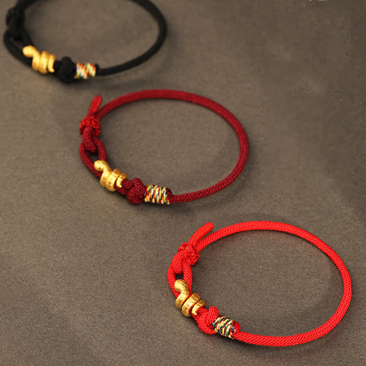 Bracelet tressé en corde de protection porte-bonheur fait main en or 999 avec motif de l'année du serpent