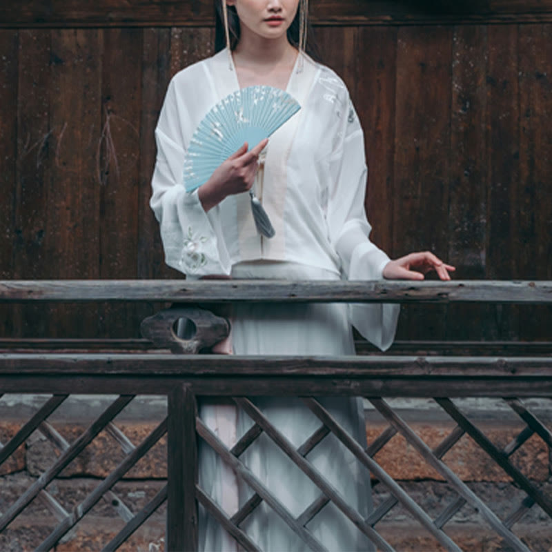 Éventail pliable en bambou et soie à main avec grue et fleurs de prunier et Buddha Stones