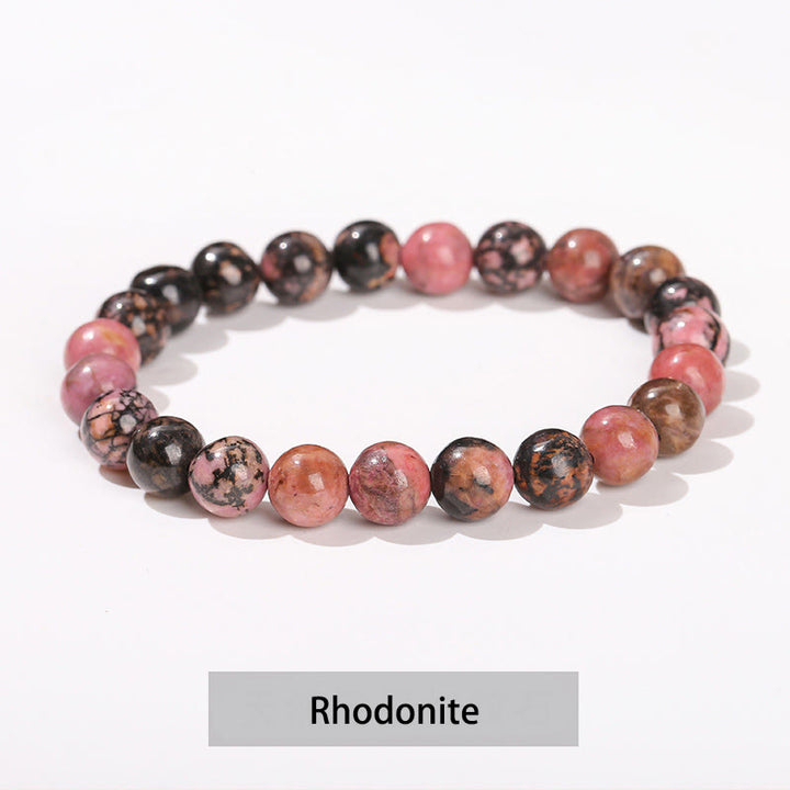 Bracelet de guérison en Buddha Stones, diverses pierres de cristal, améthyste, aventurine verte, quartz rose - image 34