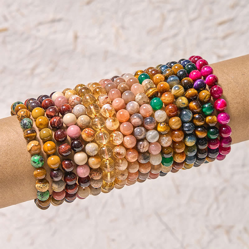 Bracelet de courage positif de la série de couleurs chaudes Buddha Stones stimulent la vitalité
