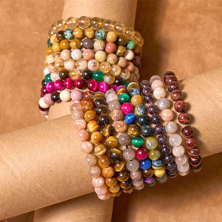 Bracelet de courage positif de la série de couleurs chaudes Buddha Stones stimulent la vitalité