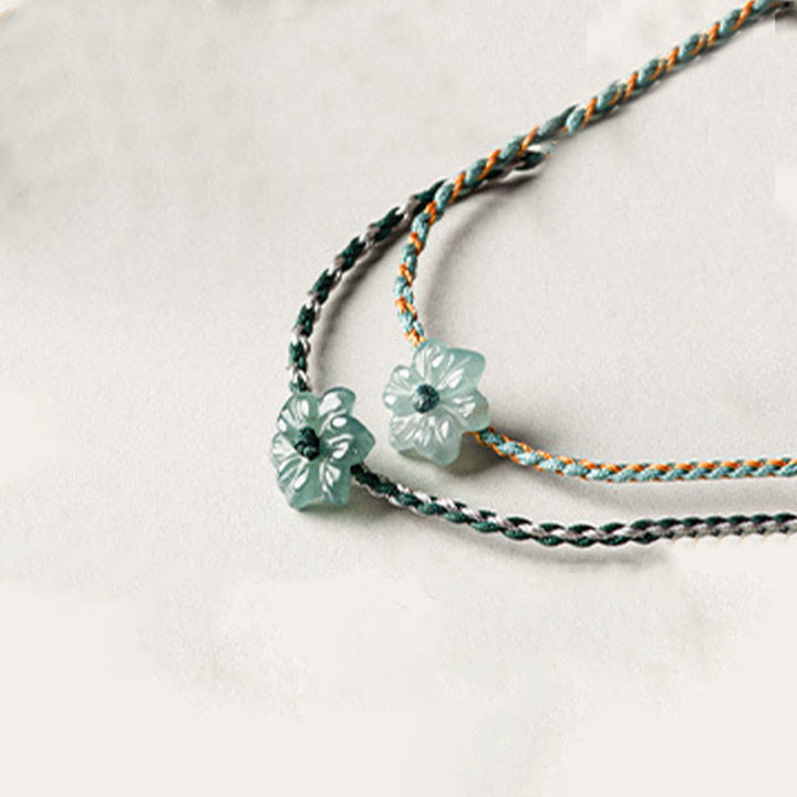Bracelet de prospérité tressé en jade orchidée verte fait main par Buddha Stones