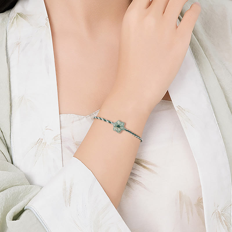 Bracelet de prospérité tressé en jade orchidée verte fait main par Buddha Stones