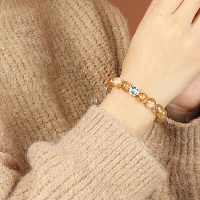 Bracelet de prospérité en quartz rutile et citrine naturelle de Buddha Stones