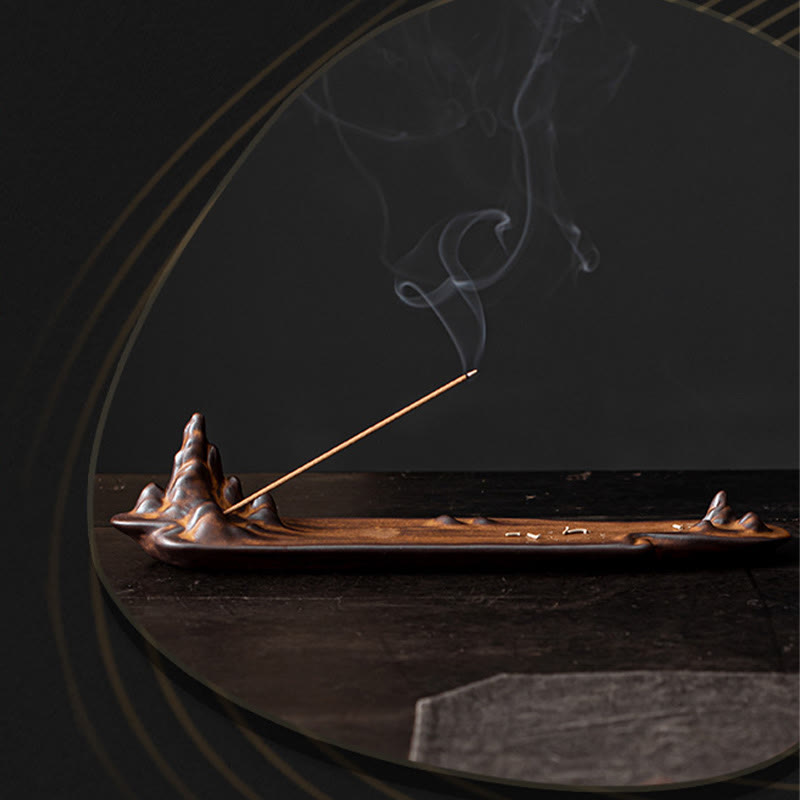 Brûleur d'encens en céramique avec Buddha Stones et montagnes et bateau