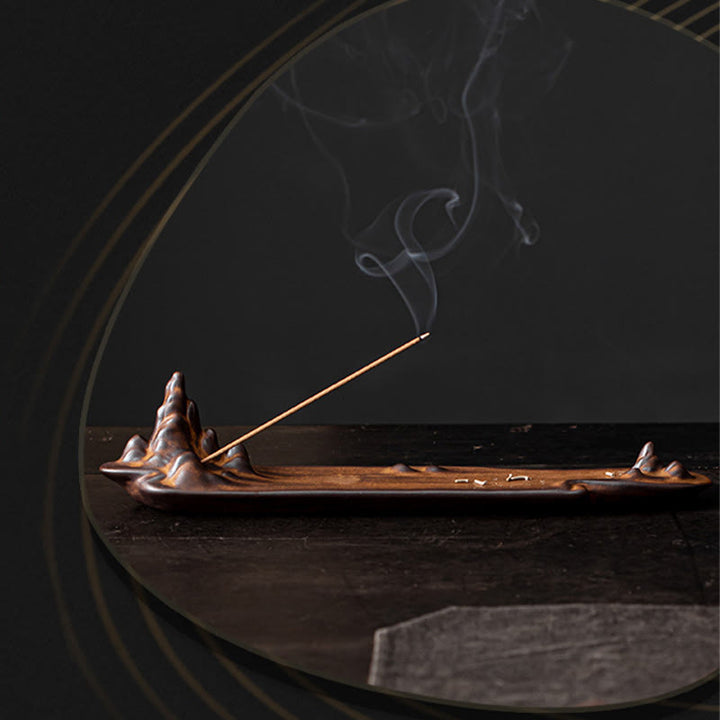 Brûleur d'encens en céramique avec Buddha Stones et montagnes et bateau