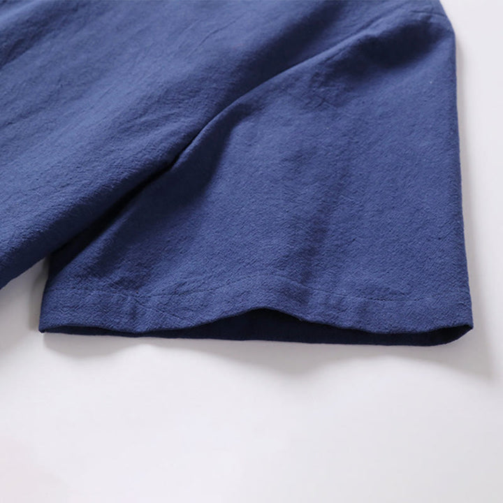 Chemise homme en coton et lin à manches courtes et un bouton grenouille Buddha Stones de couleur unie
