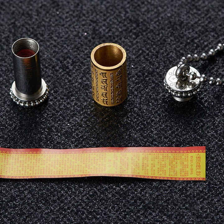 Collier pendentif d'équilibre en acier titane avec roue de prière et écritures de Buddha Stones
