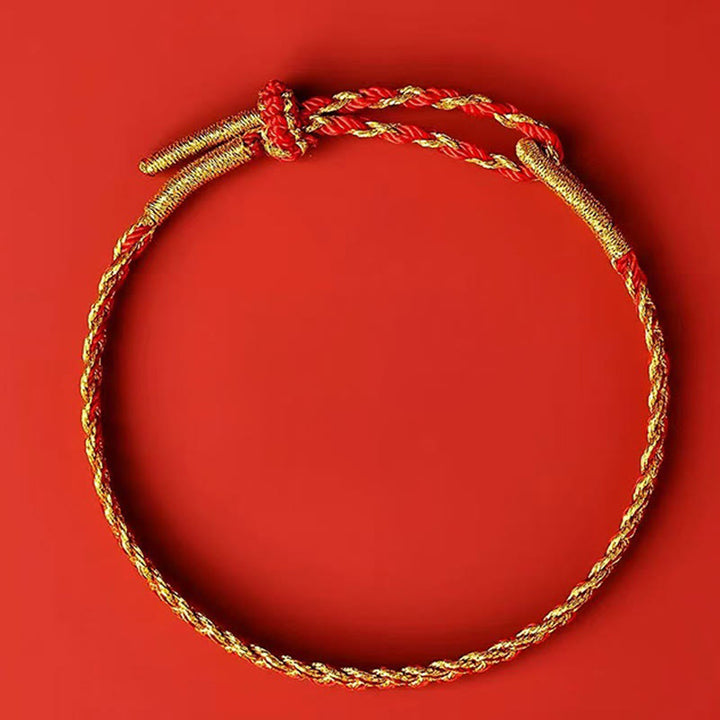Bracelet porte-bonheur en fil rouge et fil jaune Buddha Stones