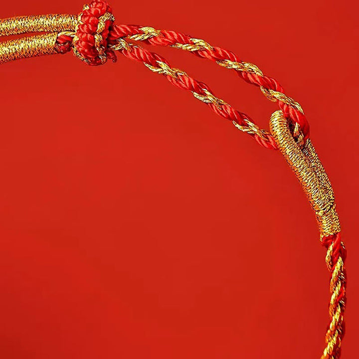 Bracelet porte-bonheur en fil rouge et fil jaune Buddha Stones