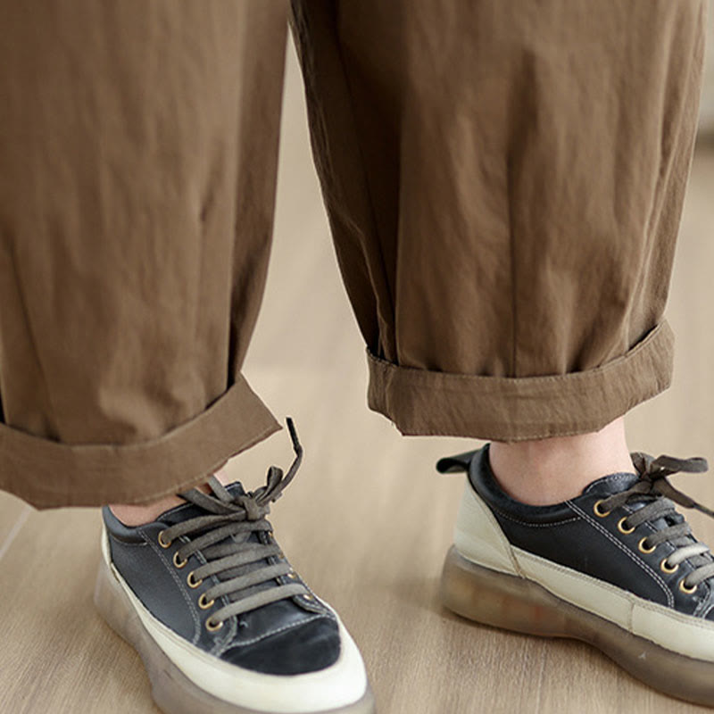 Pantalon décontracté en coton et lin pour femme avec poches et un bouton sur le dessus , couleur unie