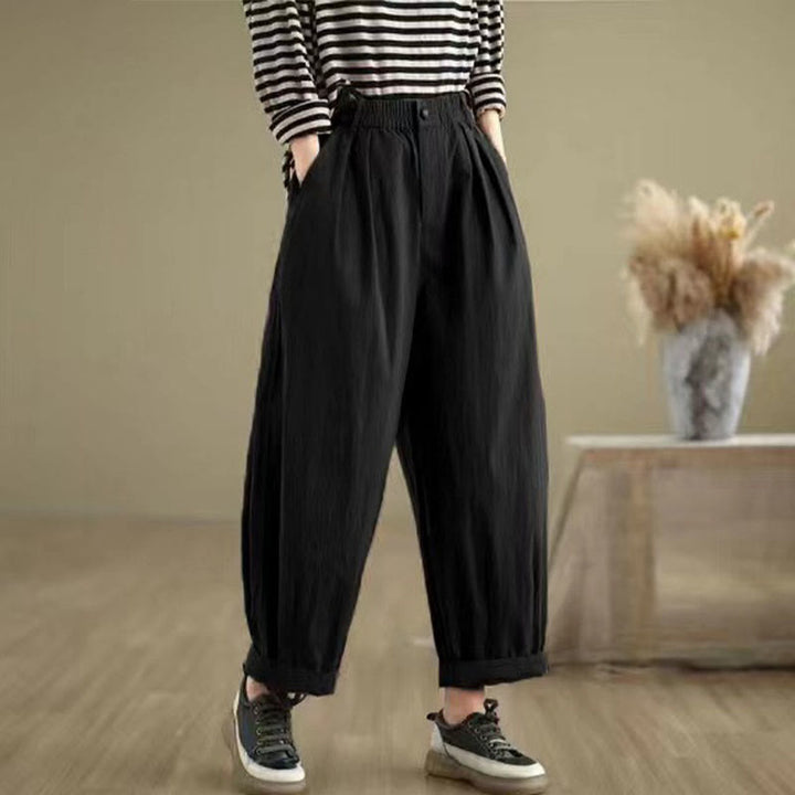 Pantalon décontracté en coton et lin pour femme avec poches et un bouton sur le dessus , couleur unie