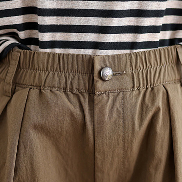Pantalon décontracté en coton et lin pour femme avec poches et un bouton sur le dessus , couleur unie