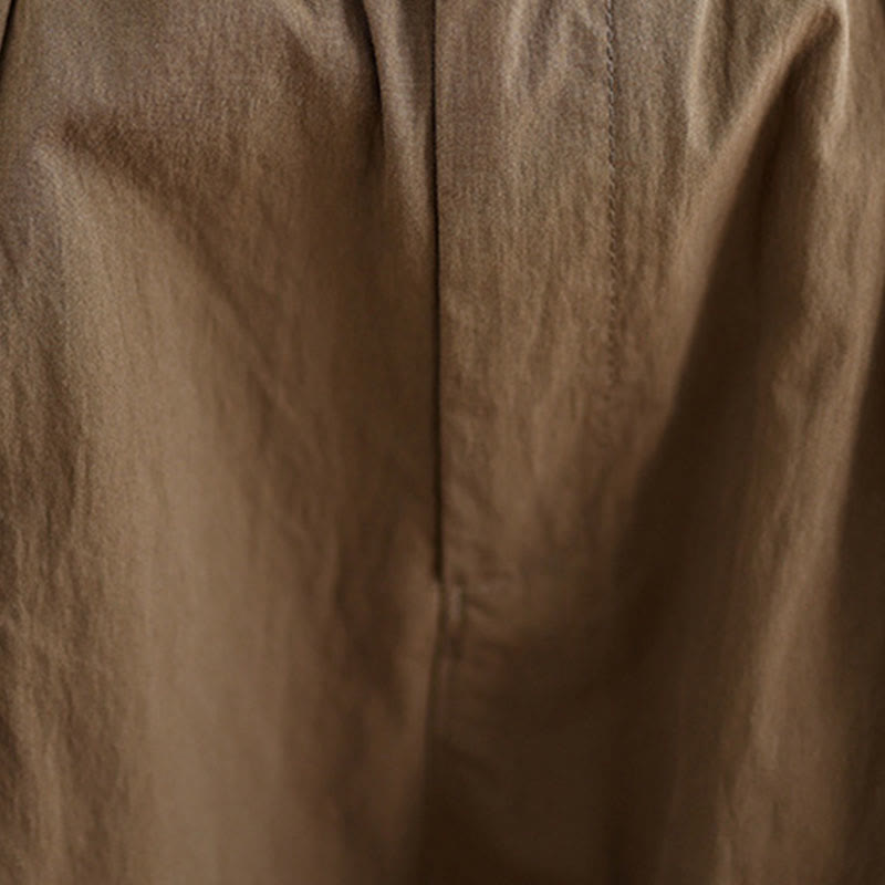 Pantalon décontracté en coton et lin pour femme avec poches et un bouton sur le dessus , couleur unie