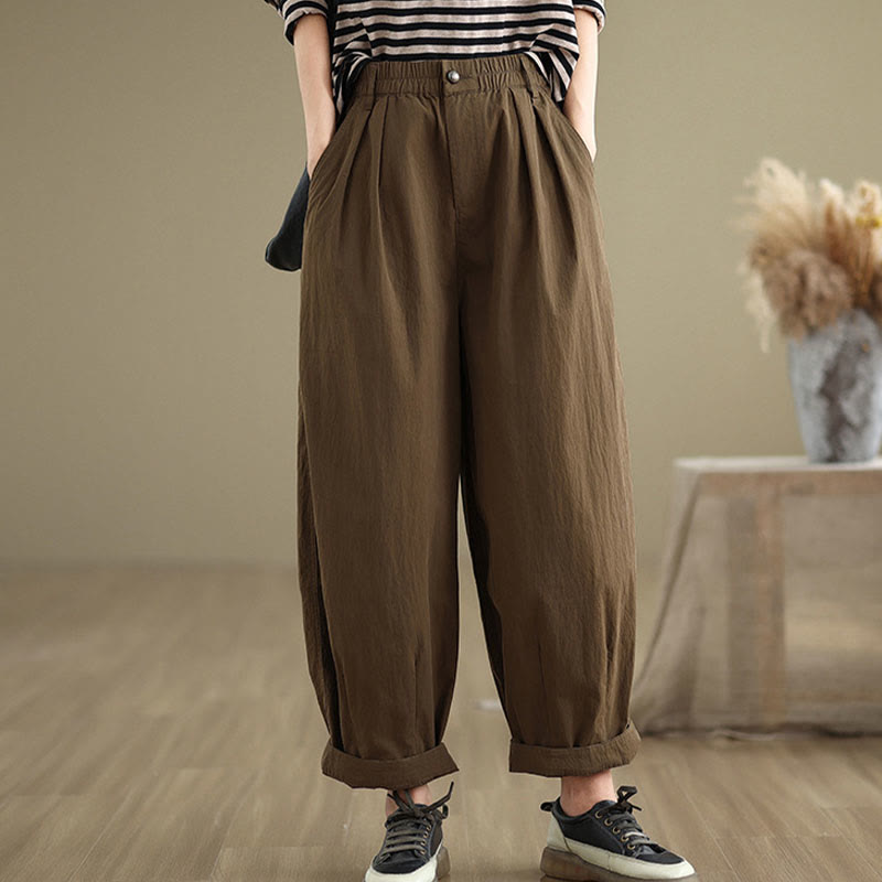 Pantalon décontracté en coton et lin pour femme avec poches et un bouton sur le dessus , couleur unie